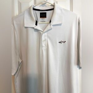 Greg Norman Play Dry Golf Polo. Men’s size Large.